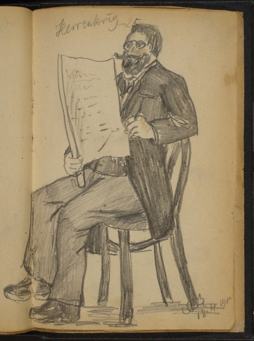 Seated Man Reading a Paper