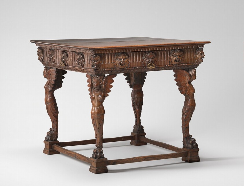 Square Table with Legs Carved as Winged Figures