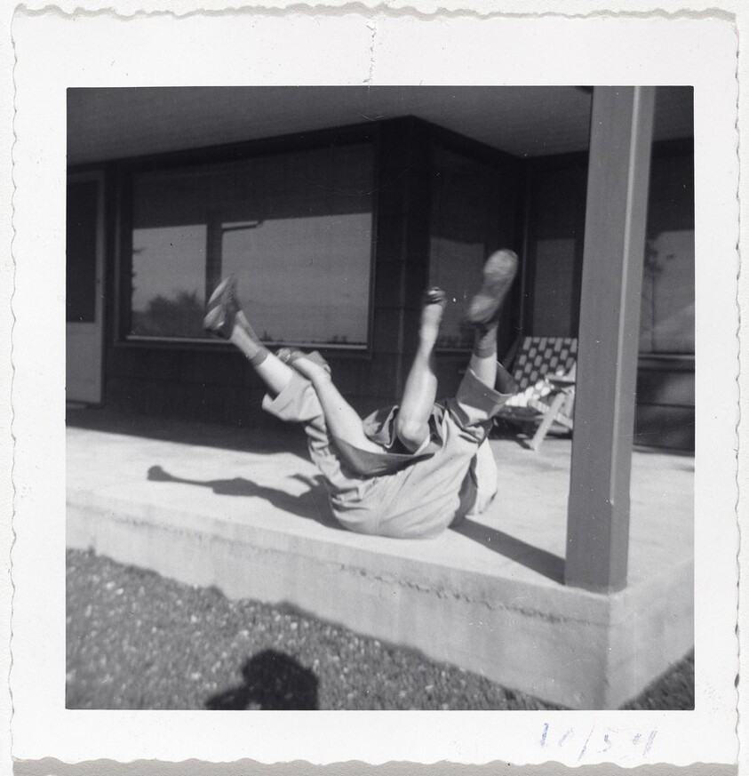 Untitled (Couple falling over on porch)