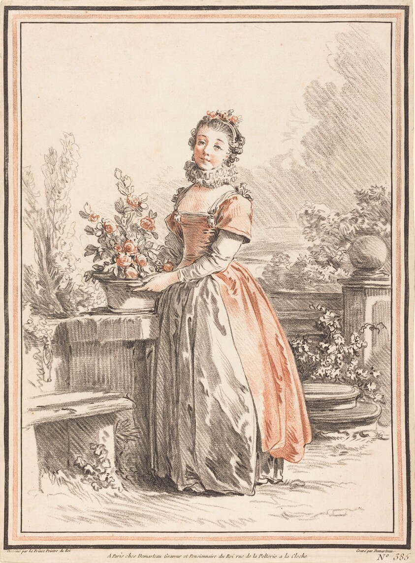 A Young Woman Standing in a Park