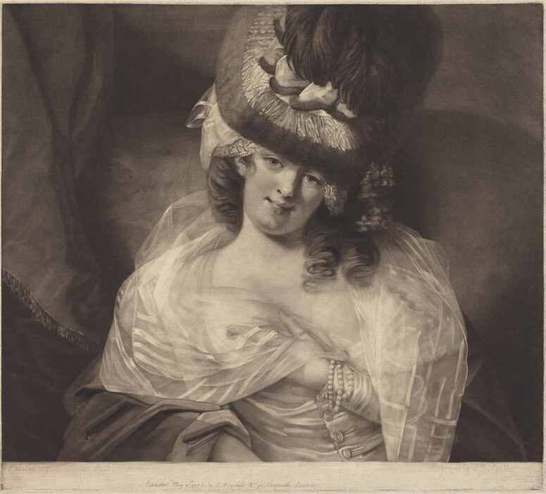 The image shows an upper-body portrait of a seated woman. She is positioned facing slightly to her right, with her head tilted gently towards her left shoulder while looking at the viewer. The woman has soft facial features, with a gentle smile and prominent eyes. Her hair is styled in loose curls that frame her face and is adorned with an elaborate hat that features decorative elements like ribbons and possibly feathers. She is wearing a sheer, flowing fabric draped over her shoulders and upper body, and a dress with visible buttons down the front. Around her wrist, she wears a string of beads or pearls. The background is a dark, textured curtain or drape that contrasts with the lighter tones of her attire and skin.