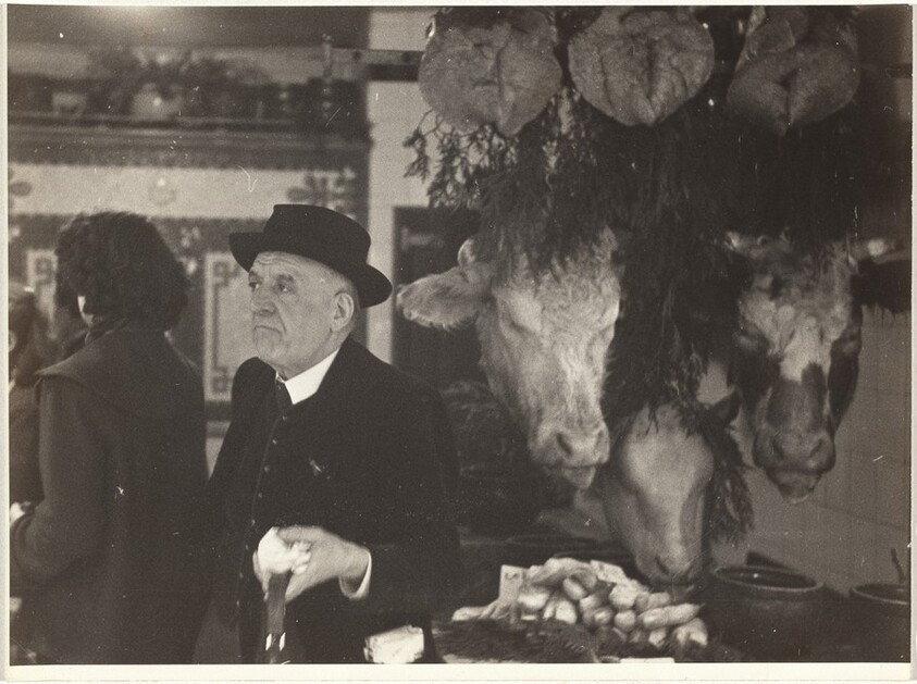 Man in butcher shop, Paris