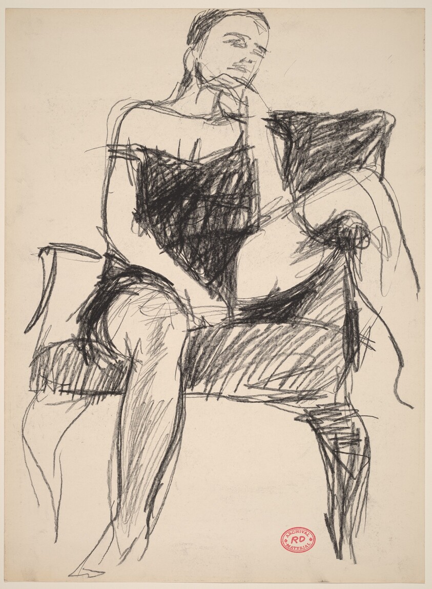 Untitled [woman seated in armchair]