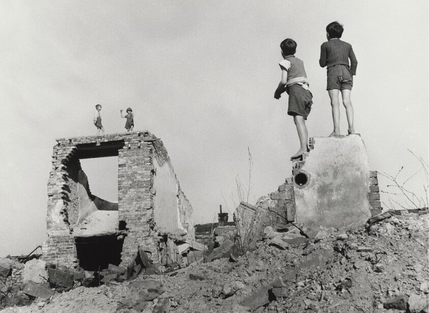 Boys play in bombed-out buildings in the working-class district of Favoriten, Vienna, Austria