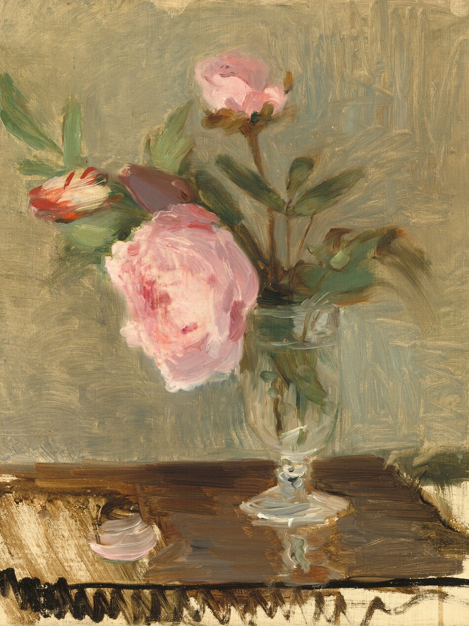 Four flowers and greenery create a loose bouquet in a clear glass in this vertical still life, which is painted with visible brushstrokes throughout. The glass has a tall, narrow, rounded bowl on a flaring foot like a drinking glass. One fully open, light pink peony bloom bows over the edge of the glass to our left. A pink bud stands upright in the glass. Two other oblong flowers, perhaps closed tulips, angle to the left. One is smoky purple, and the other is cream-white edged with brick red. One pink petal lies on the tabletop, which is painted with broad strokes of ash and earth brown. Canvas is visible along the bottom edge and in the lower corners. The background behind the flowers is painted with dashes and long strokes.