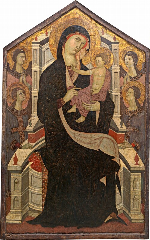A woman cradling an upright male child sits on a semi-circular throne surrounded by four winged angels in this vertical painting, which comes to a shallow, triangular point at the top. The people and angels have pale skin tinged with green, and all have flat, disk-like gold halos. The woman wears a voluminous, navy-blue mantle covered in a dense pattern of gold lines, which drapes over her head and wraps around her rose-pink gown. A sliver of a pumpkin-orange cap covering her hair peeks out from under the mantle. Her body is angled to our right and her head tilts in that direction. She looks up and to our left with large hazel-brown eyes under arched brows. Her long nose and closed, peach-colored mouth are set in an oval face. The boy’s shoulders and legs are wrapped in a rose-pink robe that leaves his torso bare. He sits in the curve of the woman’s left arm, to our right, so his body is angled toward her. He has brown hair and adult-like facial features. He reaches one hand toward the woman’s throat with his index and middle fingers raised, while she points to him with her other hand, on our left. The cream-white, stone throne curves around the pair. The back has three levels of recessed panels above a band of brick red, where it meets the wider base. The base has two levels of inset panels, and the seat is covered with a scarlet-red cloth. The front of the arms and the top of the curved back are lined with ruby-red finials. Two angels stand on each side, with one positioned higher than the other, and all four are angled inward to look at the woman and child. The angels on the bottom wear slate-blue gowns while the ones on top wear robes in the same rose pink as the child. The background in the upper zone of the painting is gold. Some areas of gold in the background and in the halos have partially worn away. The painting is in a dark wooden frame that follows the angles along the pointed top.