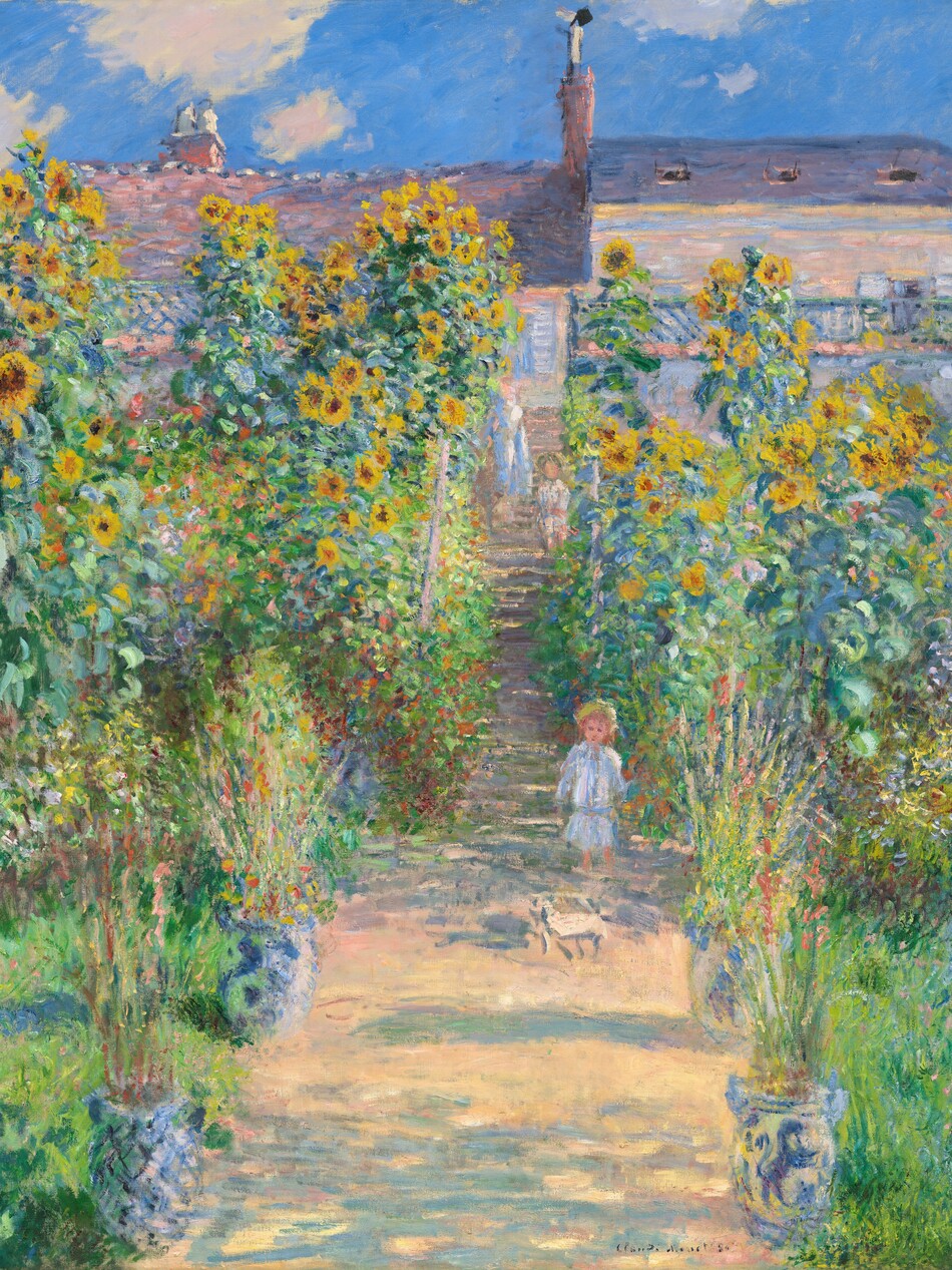 A small child stands facing us on a sun-dappled path that runs up the center of a garden dominated by towering yellow and burnt-orange sunflowers in this loosely painted, vertical scene. The light comes from our right so long, sea-green and plum-purple shadows cross the peach-colored path. The path is wide at the bottom center of the canvas and narrows as it reaches the steps of a house, beyond the garden. Close to us, four blue and white porcelain urns line the path, separating it from the grassy banks to either side. The urns are filled with tall stems with coral-pink and cardinal-red flowers. The child stands about halfway back along the path, where the garden transitions from grass to the banks of tall sunflowers. A few strokes in front of the child could be a small dog. Behind the child, a woman and another child stand on the steps. The woman wears a cornflower-blue and white dress, while both children have bare legs and wear white clothes and yellow hats. All three have indistinct facial features and peach-colored skin. The house spans with width of the composition. It has an amethyst-purple roofline with two chimneys, and the petal-pink walls have mango-yellow highlights. Windows are covered with blue latticework. Above the house, fluffy white clouds float against a vibrant blue sky. The artist signed and dated the painting at the lower right in dark blue, “Claude Monet 80.”