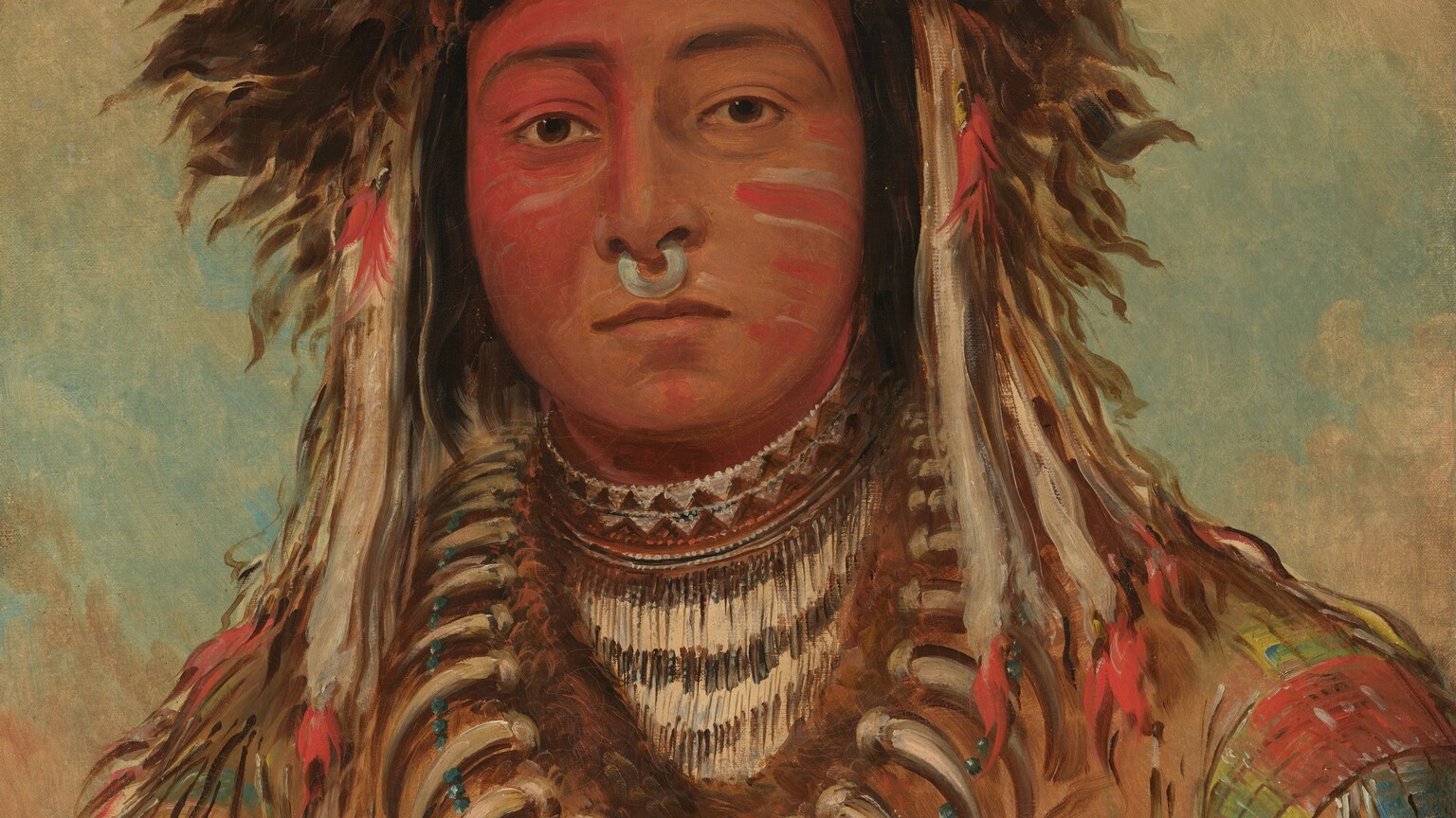 The head, shoulders, and chest of a young man with brown skin, dressed in Ojibbeway tribal attire, faces and looks at us in this vertical portrait painting. The right side of his face, on our left, is painted crimson red, and horizonal stripes of red and white line his other cheek. He looks at us with dark brown eyes under black eyebrows. A silvery white ring hangs from his nose between his nostrils. His upper lip is darker than his skin-colored lower lip, and his mouth is closed. His brown fur headdress has a cardinal-red patch at the front center. Pearl-white feathers with red tips hang along both sides of his face and down to his shoulders. The sleeves of his tan coat are streaked with sky blue, tomato red, and lemon-lime green, and fringe of the same colors hangs along the arms. Fur lining at the neck follows the curve of a string of curving, white claws and a glinting string of silvery-gray beads. He also wears a high, beaded collar with white and dark brown geometric pattern. A strap crosses his chest. The background behind him is mottled with sage green, tan, and cream white.