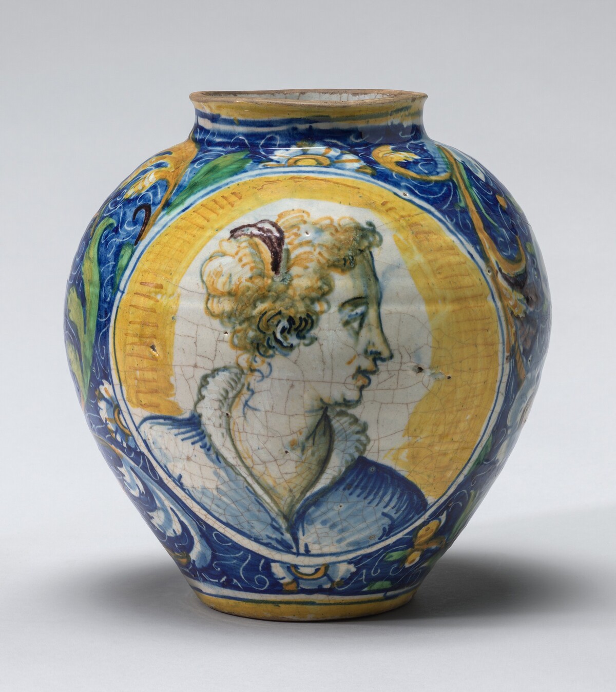 Drug jar with heads of women