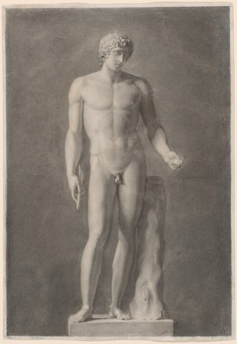 The sculpture depicts a nude male figure standing in a classical contrapposto pose with an elongated object in his right hand and his left hand raised. His hair is curly, and his facial expression appears serene. There is an irregularly shaped column or plinth supporting his stance. The sculpture is in grayscale, suggesting a light-colored material like marble or plaster. It appears life-sized and is highly detailed, emphasizing the figure's anatomical features and muscle structure.