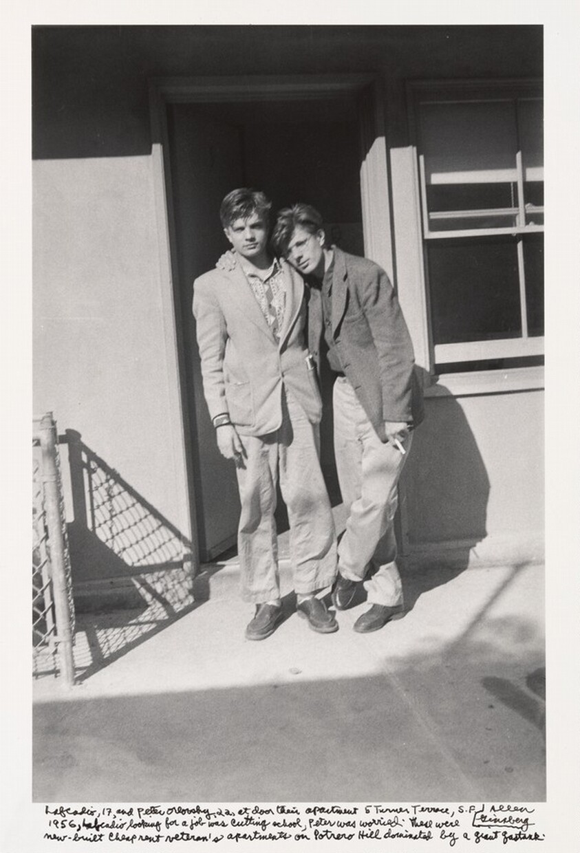 Lafcadio, 17, and Peter Orlovsky, 22, at door their apartment 5 Turner Terrace, S.F. 1956, Lafcadio looking for a job was cutting school, Peter was worried. These were new-built cheap rent veteran's apartments on Potrero Hill dominated by a giant gas tank.