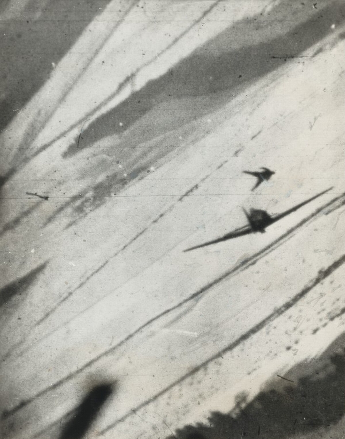 Title from caption on object: “The German Pilot of This Enemy Fighter Craft Hurtles through the Air...”