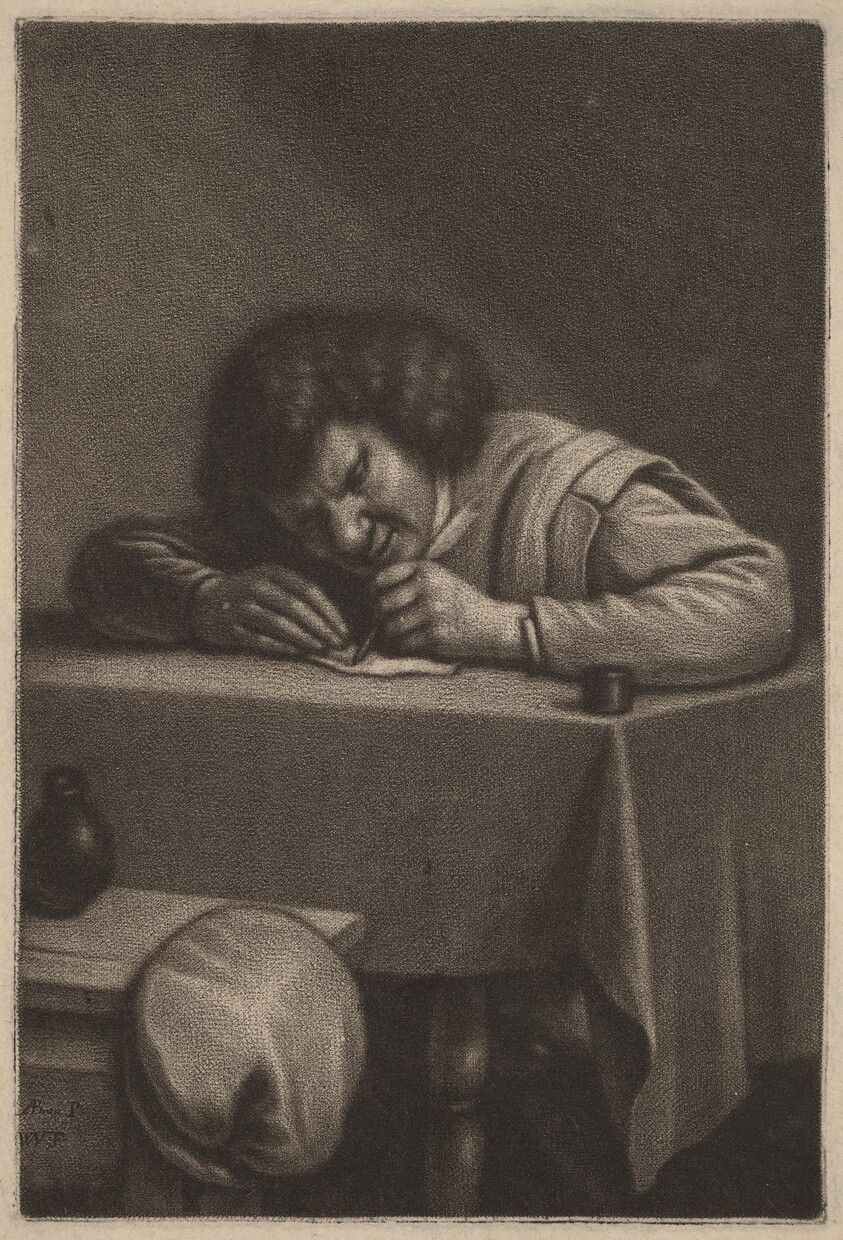 A Man Writing at a Table