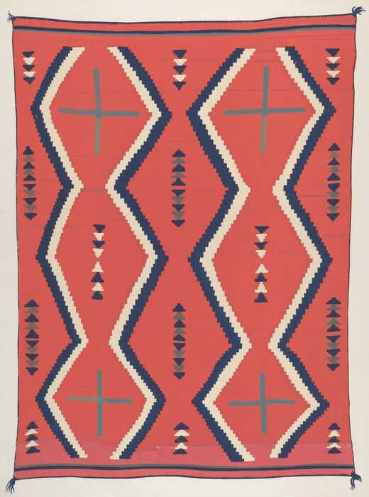 This is a photograph of a textile with geometric patterns. The textile features a design with a dominant red background. The patterns consist of zigzag and triangular shapes in white and dark blue hues, creating a dynamic contrast. Two large cross-like motifs in muted blue-gray are symmetrically positioned near the top and bottom centers. These motifs are set against vertical zigzag lines. The textile is symmetrical on each side, with intricate triangle patterns aligning vertically. The edges of the textile are bordered with thin lines in darker shades.