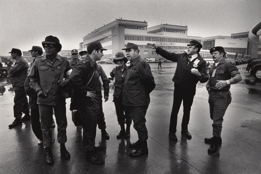 Army personnel waiting on tarmac to greet first refugee flight, Harrisburg airport