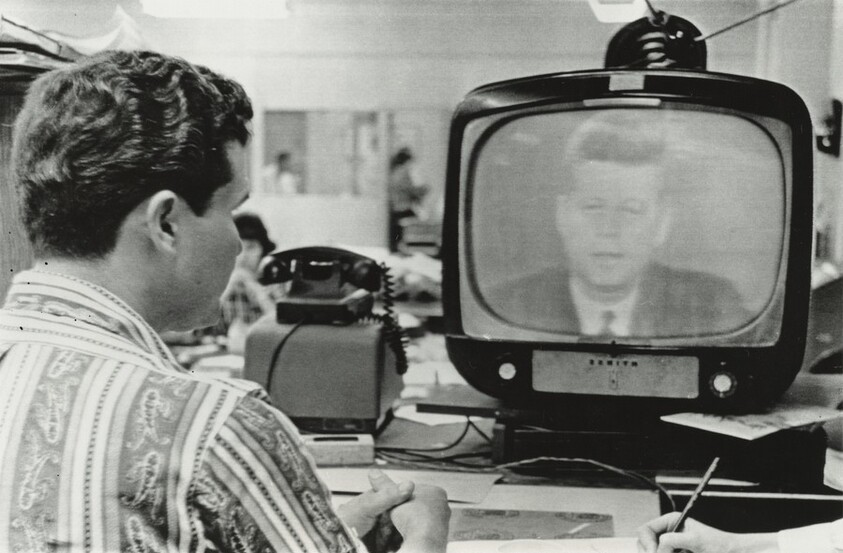 Title from caption on object: “One of Miami's Cuban Refugees, Federico Fidel Fernandez, Listens to President Kennedy...”