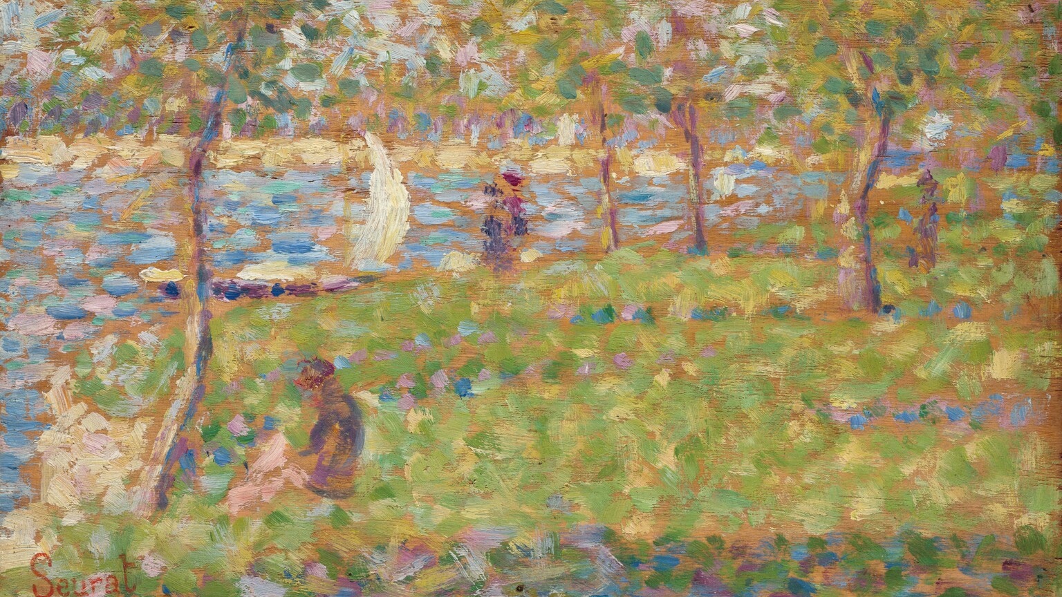 This horizontal landscape is painted with dots and dashes in fresh green, shimmering blue, amethyst purple, shell pink, pale yellow, and cream white against the brown wood of the panel, which is visible throughout. Though loosely painted, a scene with a grassy area hemmed to our left and along the back with a body of water comes into focus. A person sits near the bank to our left. Daubs in violet could be more people walking in the near distance among trees. An arc of white suggests a sailboat near the shoreline off to our left. The artist signed the painting in red in the lower left, “Seurat.”