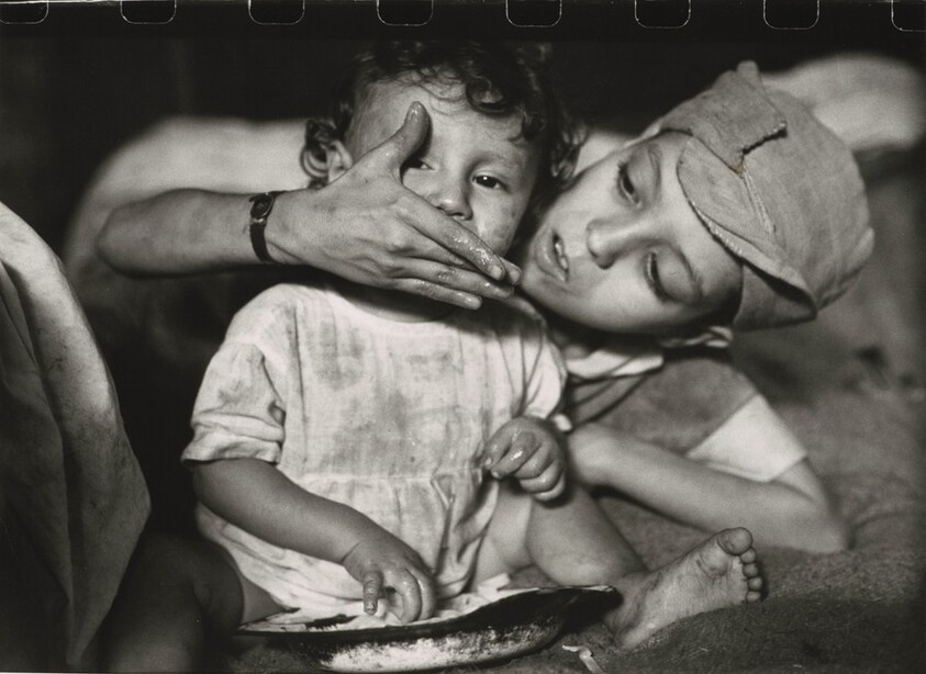 Flavio Feeding Zacarias