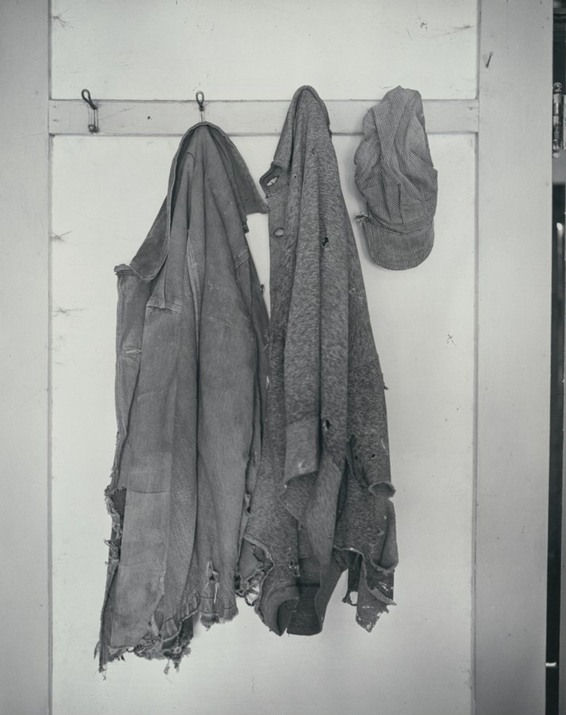 Clothing on Hooks, Norfolk, Nebraska, Wright Morris, 1947