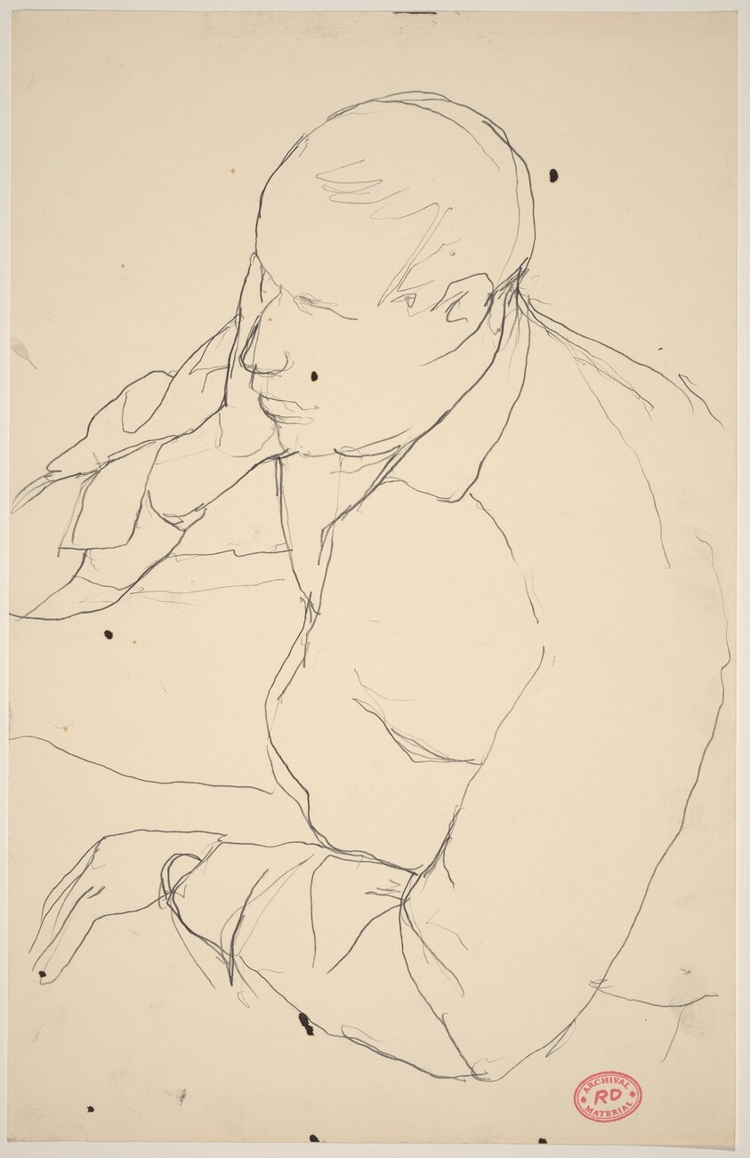 Untitled [man resting head on hand]