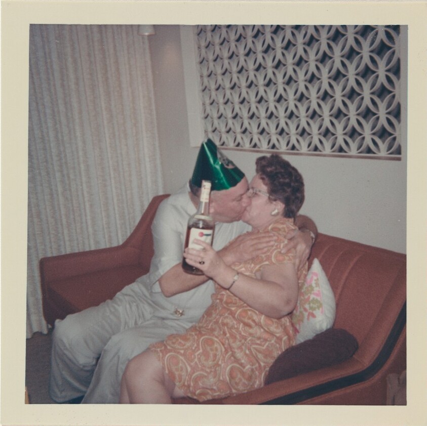Untitled (Couple kissing with bottle of liquor)