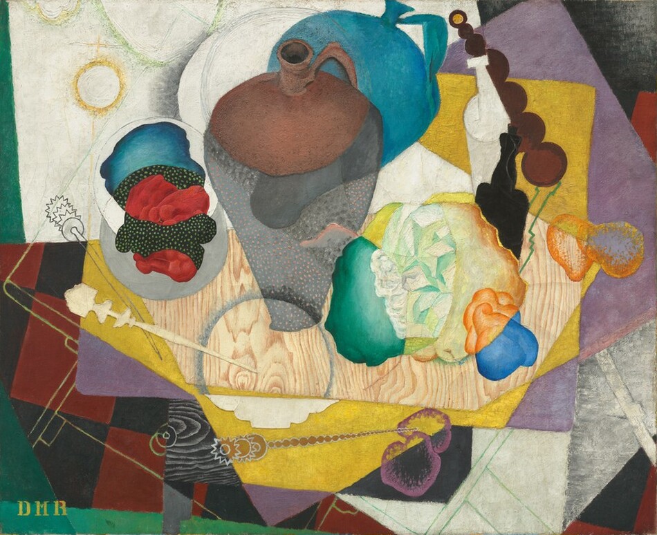 An abstracted jug, bottles, shapes reminiscent of balled up paper or fabric, and a needle-like letter opener are gathered on a wood square in this horizontal still life painting. Rectangles in shades of corn yellow, violet purple, burgundy red-and-black checks, white, black, and spruce green splay out behind the objects like untidily stacked placemats. The brown jug is at the center, and an echo of its form in teal blue presumably represents a shadow. Portions of the jug, wooden board, and crumpled material shift color and pattern as they intersect or overlap with other areas. The artist’s initials, “DMR,” are stenciled in yellow in the lower left corner.
