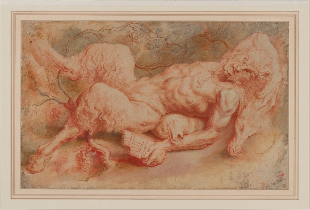 Drawn with red and black chalk on cream-colored paper, a satyr has a man’s muscular upper body and the legs of a goat as he lies sprawled on his back across the width of this horizontal sheet. He lies with his head to our right and hooves to our left. His right arm, farther from us, is flung over his head and with that hand, he touches the sheep’s skin on which he reclines. The sheep’s head rests near the satyr’s shoulder. The satyr’s eyes are blank under lowered, deeply furrowed brows. His nose is bumped over the bridge and pointed at the end. His full lips are open to reveal his tongue and lower teeth over a cleft chin. A mustache or goatee is loosely drawn, and hollows in his cheeks suggest high cheekbones. A wine skin, like an oversized hot water bottle, is tucked under the hollow of his lower back. His left arm, closer to us, lies along the side of his body, and he holds a pan flute in that brawny hand. He has the furry haunches of a goat, and his legs are splayed so his hooves reach into the upper and lower left corners of the sheet. A grapevine with a few clusters of fruit curls behind his lower limbs and meanders across the background. Gray washes and sketchy lines are layered behind the vine. A tiny uppercase “R” appears to be penned near the lower right corner. Lower in that corner, a round stamp has a crown over an uppercase “W” above the letters “JCR.”