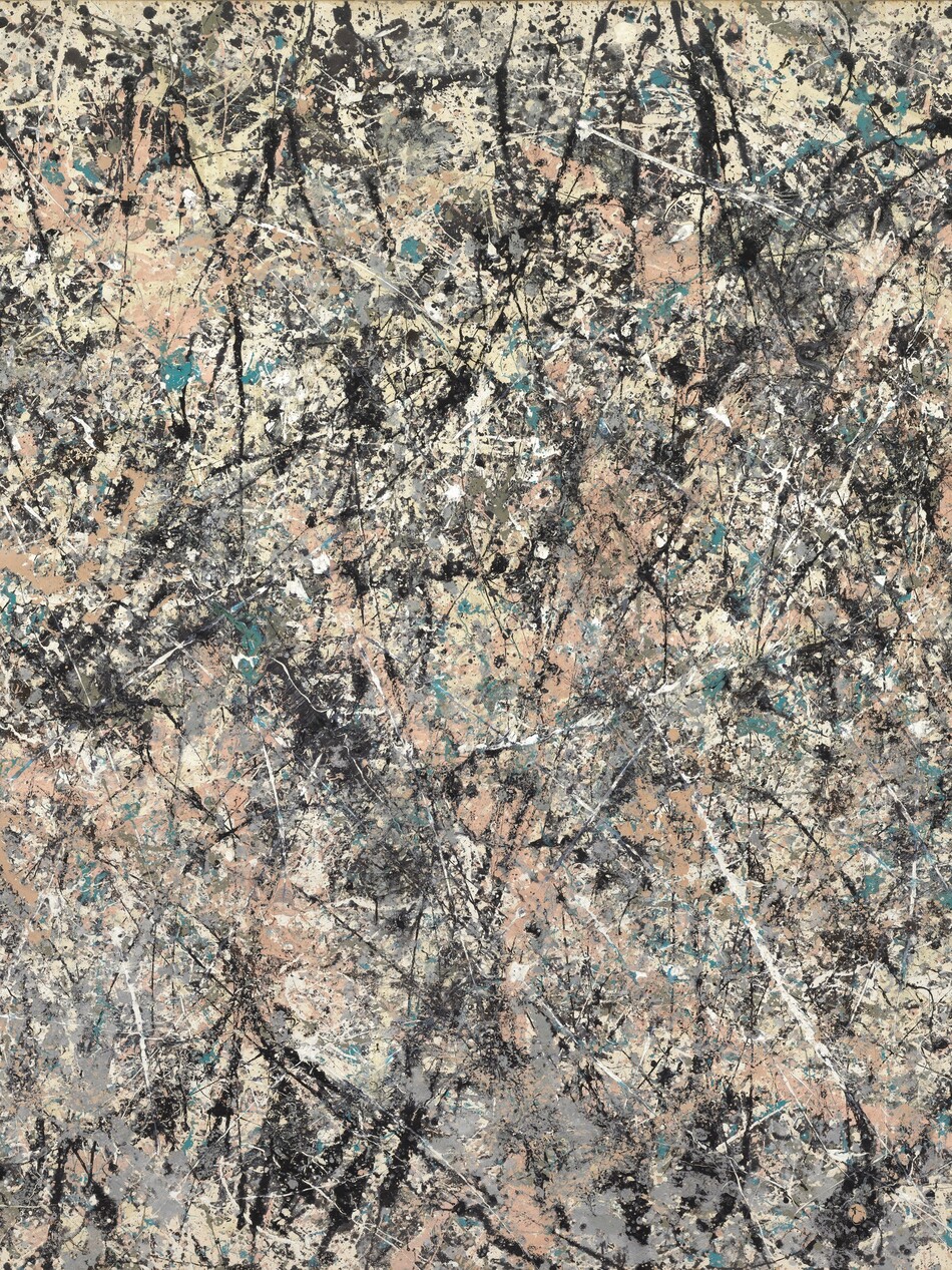 Densely spaced lines and splatters in black, white, pale salmon pink, teal, and steel gray crisscross a rectangular cream-colored canvas in this abstract horizontal painting. The lines move in every direction. Most are straight but some curve slightly. The density eases a bit near the edges. Two sets of ghostly white handprints are visible at the upper corners. The artist signed and dated the painting in black paint in the lower left corner: “Jackson Pollock ’50.”