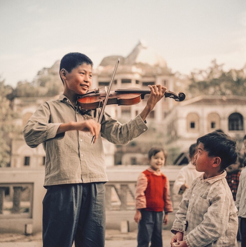 A Boy Playing the Violin in Gulangyu Island, Xiamen Province