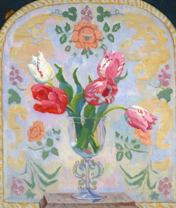 This painting shows a glass vase filled with tulips in various colors, including white, pink, and red. The green stems and leaves of the flowers show through the glass vase, which has the shape of a wine glass with curved handles around the stem. The background has intricate patterns with floral and vine motifs forming an arch-like design around the vase in pastel colors of blue, yellow, green, and light orange.