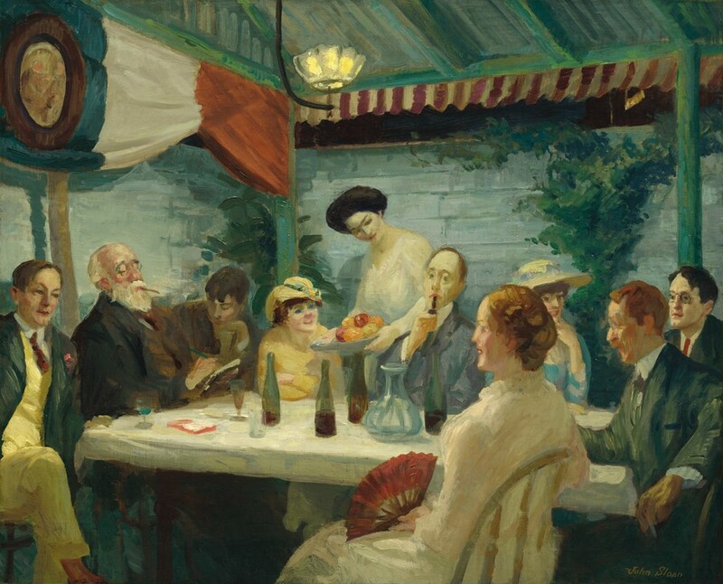 Six men wearing ties and four women in long dresses are gathered around a long, rectangular table set near a corner of a room in this horizontal painting. This scene is loosely painted and brushstrokes are visible throughout, so some details are indistinct. One of the long sides of the table stretches across the composition, and angles a little away from us to our left. Closest to us and to our right, a woman wearing a white dress with a high, ruffled collar sits in a wooden chair facing our left in profile. A brick-red fan rests open in her lap. Two more women wearing straw-yellow hats sit among the men on the far side of the table, as the fourth woman stands behind the table, bringing a dish of fruit. That woman's dark hair is gathered loosely atop her head, and she smiles down at a man holding a pipe to his mouth. The men all have short hair and a few of them are cleanshaven. To our left, a man with a full, white beard and possibly wearing glasses sits smoking a dark cigarette or cigar as he looks down, head tipped back, at something he draws or writes in a notebook. At the other narrow end, to our right, a man with a red mustache and beard seems to speak, his mouth open. Many of the people smile, and their gazes travel across the table at all angles. Some lean back in their chairs and others lean toward or on the table. Their clothing is painted mostly in tones of gray, olive green, buttercup yellow, and brown with a few touches of rust red. The table is covered with a white cloth and set with four bottles, a wide-bottomed, glass carafe, and several wine glasses. Vines or another plant grows up the sky-blue, paneled wall to our right and in the corner opposite us, to the left of center. The wall to our left is draped with a red, white, and blue swag hanging from the ceiling. The beams of the ceiling and the underside of the planks there are painted pale teal green. The single light hanging from the ceiling resembles an open flower as the glass sides curve up around the light. The artist signed the painting in the lower right corner: “John Sloan.”