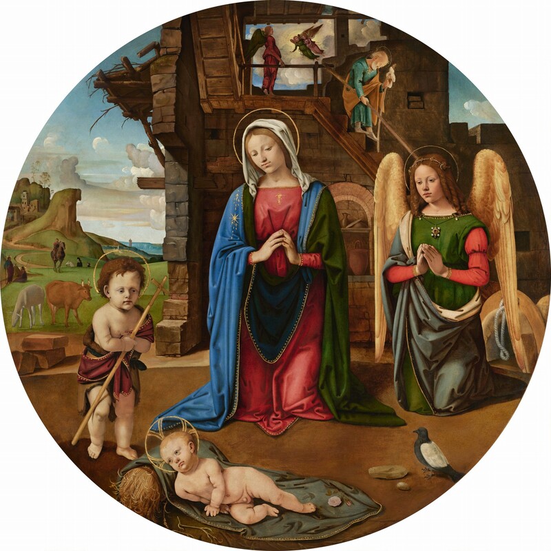A woman and a winged angel kneel and a child stands, all looking at a nude, chubby baby who lies on a slate-blue cloth under the ruins of a structure in this round painting. Three more angels and several more people are in the background. They all have pale, peachy skin with wide-set eyes and gold rings for halos. Their full lips are closed, and they have short philtrums over wide mouths. The woman, Mary, kneels at the center of the composition with her body facing us. Her face tips to the left, and her fingertips touch in front of her chest. A white cloth covers her head and drapes to her shoulders. She wears a rose-red dress and lapis-blue cloak lined with pine green, all of which puddle on the ground around her knees. To the right of Mary, the angel’s hair falls in brown, shoulder-length ringlets under a diadem of pearls and gems. Also with hands together in prayer, the angel has butter-yellow wings and wears an emerald-green garment with red sleeves under a muted blue cloak and a jeweled pendant around the neck. Saint John the Baptist, the child standing to the left, has short, brown curly hair and wears a fur-like garment under a burgundy-red cloth. His and the other’s clothing are edged with gold. Saint John clutches his hands together at his chest and holds a staff with a narrow cross at the top. At the bottom center, the nude baby lies with his head propped up on a bushel of wheat on the blue cloth. With his head to our left, he lies on his right hip so his body faces us. A pink rose lies at his feet, and a black and white bird perches on the dirt ground nearby. The facing wall of the stone structure behind the group is missing. A balding man with a white beard and hair steps carefully down a stair near the second level. He wears an aqua-blue robe under a golden yellow cloak and uses a tall staff for balance. More stairs lead to a third level. Through an opening in the back wall, two angels float on a bank of dense clouds in the sky as a barefoot angel stands on the landing, looking to our right. An alcove on our level in the building behind Mary holds a jug, dishes, and a tall vessel. An ox and ass stand in a grassy field to the left of the building. Farther back and on a dirt path, a man with a tall staff and a halo holds one hand up to face a person sitting the grass. The seated person also has a staff with a narrow cross at the top. A man on horseback near that pair gestures to our right, and two more people travel along the path on the far side of the hill. The path leads back to buildings tucked in among steep, grass-carpeted cliffs to the left and, beyond Saint John the Baptist, to hills rolling back to a town and a hazy blue horizon. Pale gray and white clouds bustle across the blue sky.