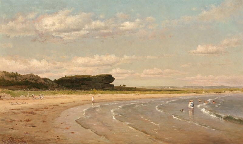 We look slightly down onto a bay that curves away from us into the distance and to our right in this horizontal landscape painting. C-shaped, shallow waves lap at the sandy beach from our right. Several people standing and playing in the water wear hats and long-sleeved shirts. Two women there hold up their skirts as they wade in the ankle-deep water, a small brown dog close behind them. Another person wearing white walks on the wet sand, and four more gather a short distance away, to our left, perhaps on a blanket. Opposite us and far away, brown horses pull a carriage along the beach. The taupe-colored sand is hemmed in by a curving band of celery-green grasses, which in turn surround dunes or hills and a rocky formation. A tree-lined hill gives way to the rocky promontory that juts onto the beach where the shoreline curves to our right. The promontory has a crack near the bottom, resembling the open mouth of a turtle. Beyond this, touches of white paint suggest buildings deep in the distance, in front of slate-gray hills lining the horizon. In the top two-thirds of the picture, flat-bottomed, white clouds drift across a sky that deepens from nearly white along the horizon to pale blue across the top edge of the composition. The artist signed the painting in the lower left corner, with spiky, left-leaning letters in lavender purple: “W. Whittredge.”