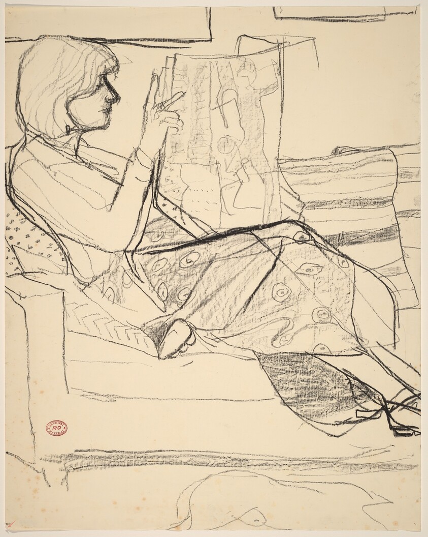 Untitled [woman reading a newspaper]