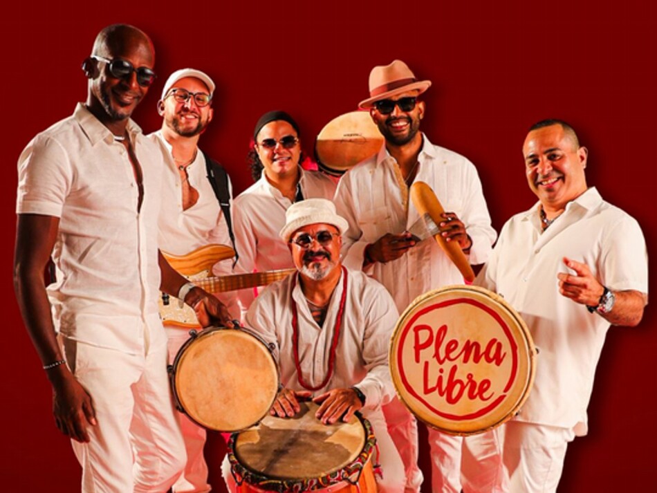 A band posing with their instruments.