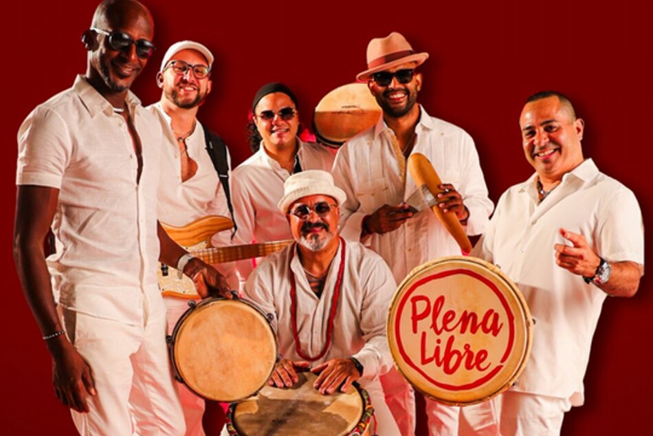 A band posing with their instruments.