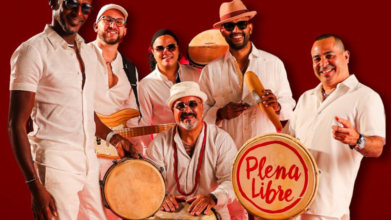 A band posing with their instruments.