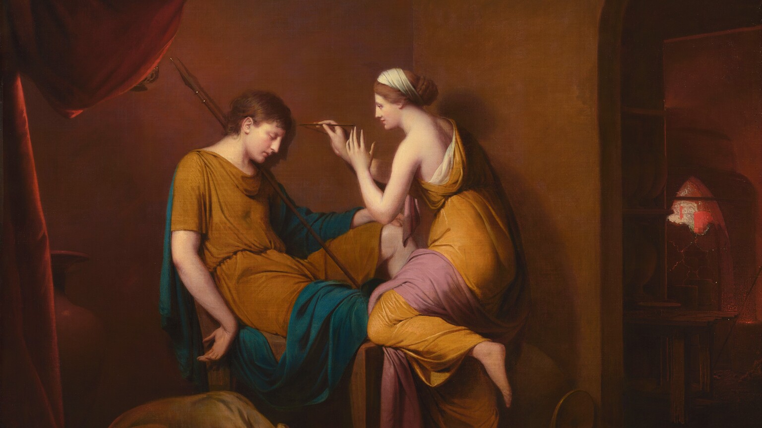 A woman leans forward to trace the shadow cast by a sleeping young man on a wall in a dimly lit room in this horizontal painting. Both people have smooth, pale skin, long, straight noses, thin lips, and brown hair. The man sits and sleeps on a deep, wood chair. The scene is lit from over our left shoulder so he casts a shadow on the brown wall on which he leans. His right arm, closer to us, hangs by his side with his palm turned to face away from his body. The other arm lies across his bent knee. He wears a harvest-yellow tunic, and a sapphire-blue cloak drapes over his far arm and the thigh closer to us. A long spear rests across one shoulder, and a thin, muted-brown dog, like a greyhound, sleeps on the ground by the man’s side. The woman leans one knee onto the chair and reaches out with a stylus to capture the man’s shadow. She is barefoot and smiles gently at his face. She also wears a dark yellow dress, which exposes one bare shoulder. A mauve-pink cloth wraps over one shoulder and the bent thigh. A deep red curtain bunched up in the upper left corner hides the light source. An urn, nearly as tall as the chair, stands behind the man and another is tipped over behind the woman. An arched opening leads into a darkened room to our right. Rectangles of red and white seen through the top of a pointed arched window there are difficult to interpret. A table and some shelves with more urns are deep in the shadows.