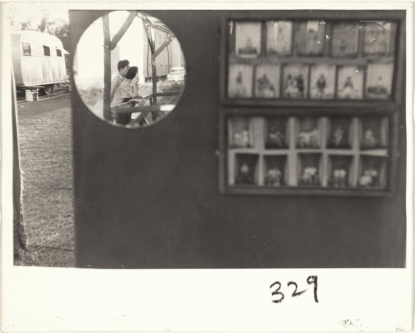 Couple seen through mirror--Baton Rouge, Louisiana