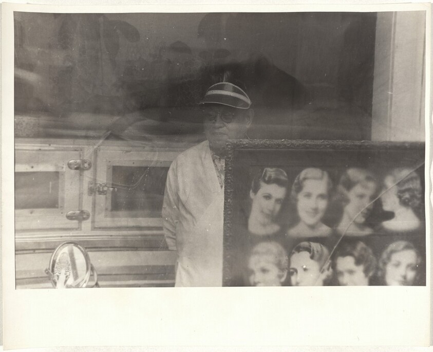 Man with parakeet--San Francisco