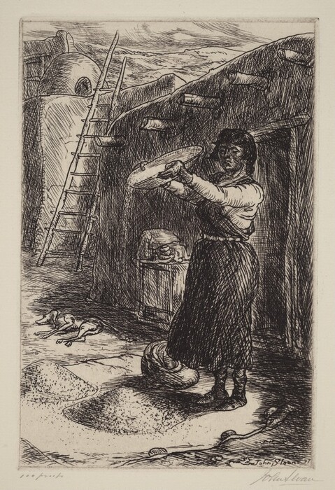 The image shows a full-body view of a person standing and holding a round, flat object above a low wooden structure resembling a table. The individual is wearing a long-sleeved shirt and a long skirt cinched at the waist, in a slightly leaning stance. The person's facial features are detailed with prominent eyebrows and a serious expression, and their dark, wavy hair falls around their face. They are surrounded by an outdoor scene with a rustic building structure, a wooden ladder, and an oven-like structure. On the ground, there is a small animal lying and mounds of material, possibly grain. The background displays hills or mountains under a cloudy sky, completing the scene.