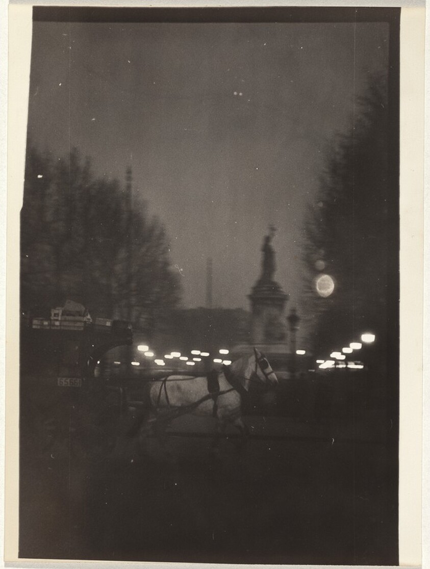 Horse drawn carriage at night, Paris