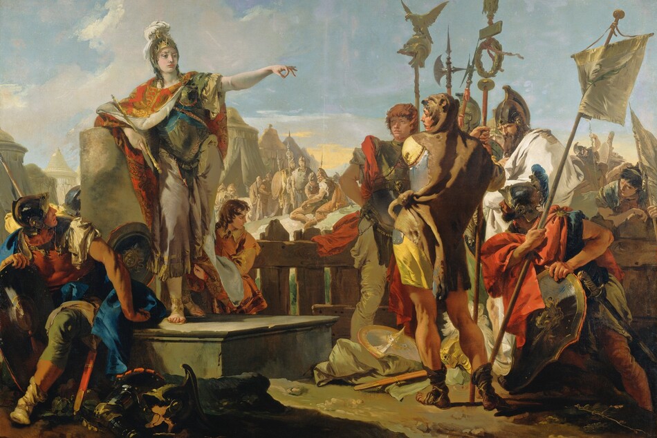 A woman wearing a breastplate and helmet over a toga stands to our left on a platform, gesturing with one arm extended to a group of about a dozen soldiers gathered around her in this horizontal painting. The woman has pale white skin and most of the soldiers have ruddy complexions. The woman stands with her body facing us but she turns her head to our right, looking toward but not at the knot of soldiers clustered there. She leans on her right elbow, on our left, resting on the flat top of a broken column, and she holds a scepter in that hand. Her other arm is raised and her fingers are extended except for the index finger and thumb, which touch to make a circle. Her gold helmet is encrusted with gems and a white plume issues from the top. Her red and gold cloak is fastened around her neck and falls open to reveal her armor and sandal-clad feet. A shield rests on the platform near her feet, and other pieces of armor are scattered on the dirt ground near the platform. A young boy with chestnut-brown curls holds her cloak behind her and to our right. In the lower left corner of the painting, one soldier sits on the edge of the platform, and he twists and looks up at the woman. Several soldiers standing in a group to our right carry shields, banners, and halberds, which are tall, ax-like weapons. The men wear helmets and breastplates, and cloaks in canary yellow, crimson red, and ivory white. The man closest to us stands with his back to us, and he looks over his shoulder at the woman. An animal skin wraps around his shoulders and the head of the animal drapes over his head. More soldiers and tents in the middle distance are painted in almost monochromatic tones of peanut brown and taupe. The sky above is blue with a few white clouds, except for a band of soft yellow along the horizon.