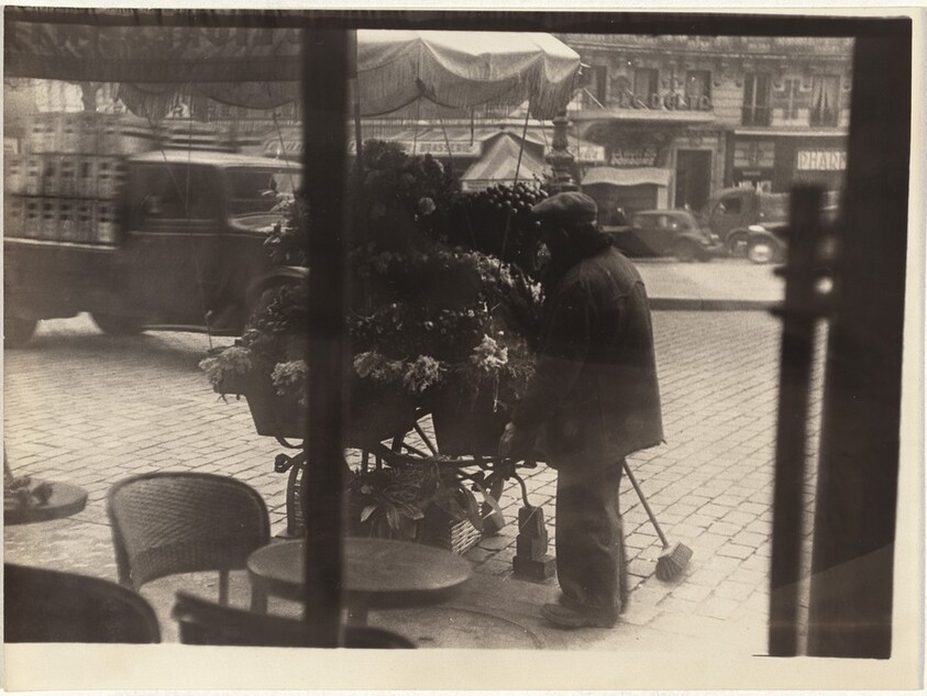 Flower cart outside café, Paris