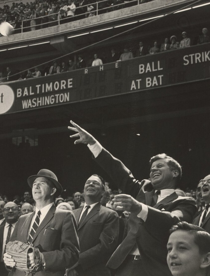 President Kennedy, Surrounded by Political and Baseball Dignitaries, is Shown at the Moment He Threw Out the First Ball at D.C. Stadium Yesterday