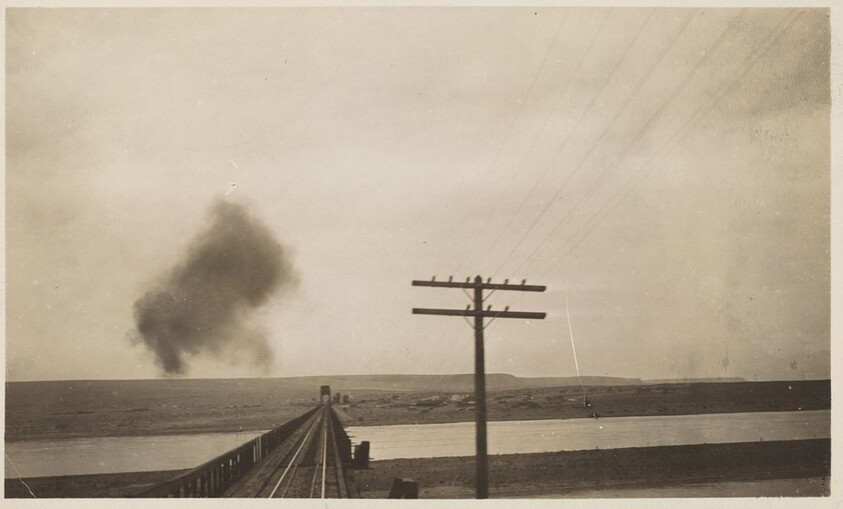 Untitled (Train tracks with puff of smoke)