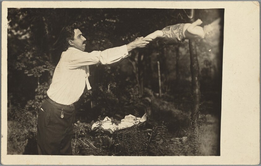 Untitled (Man tossing baby in woods)
