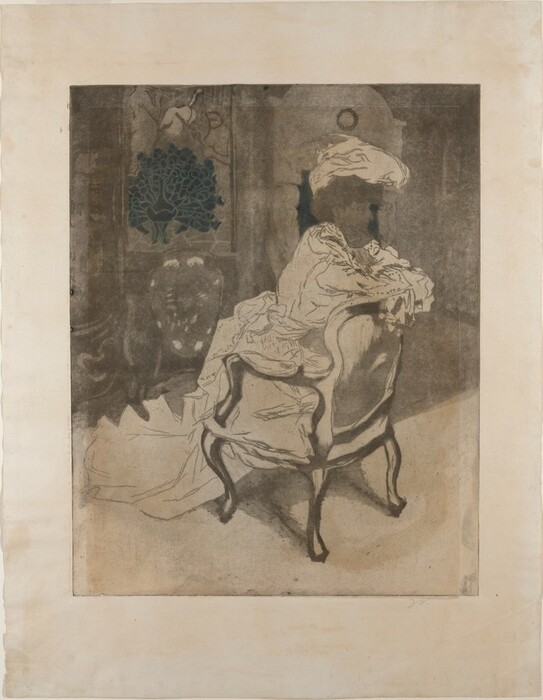 The image shows a person sitting in a chair, in a reclined position with their arms resting on the backrest. The person's face is not shown clearly and they are wearing a floppy hat. They have a voluminous outfit with intricate details, appearing to be made of light fabric. The furniture is ornate with a wooden frame, and there is a decorative element in the background that features a stylized peacock along with other abstract designs.
