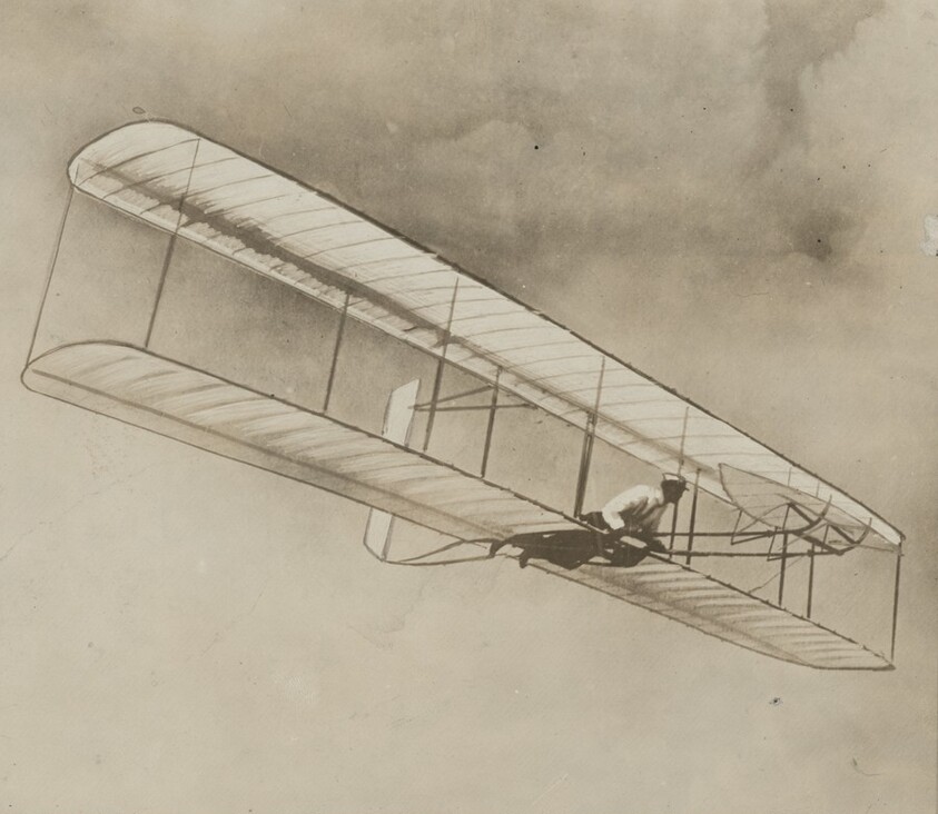 Title from caption on object: "The Wright Brothers in Gliding Machine”