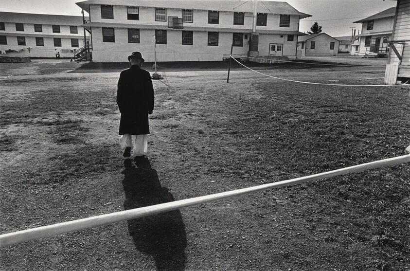 White tape indicating boundary of containment area; the camp was technically not on American soil